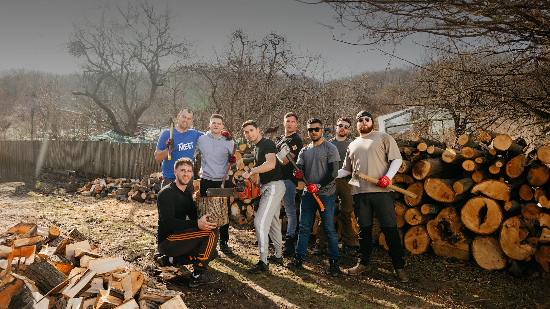 Humanitarian aid team delivering firewood