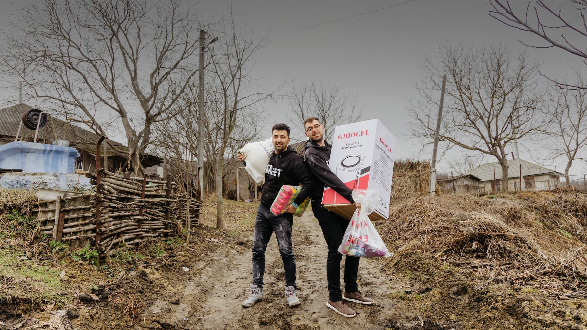 Volunteers delivering electrodomestics and basic necessities